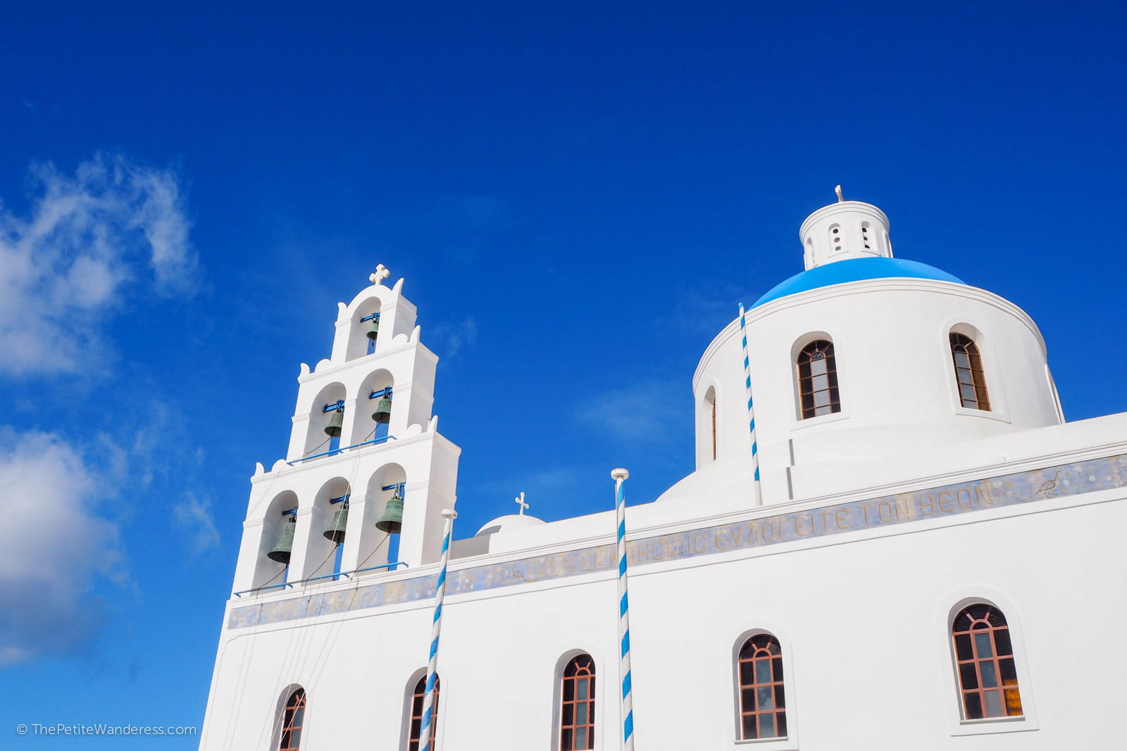 church at Oia | Santorini in shades of blue & white • The Petite Wanderess
